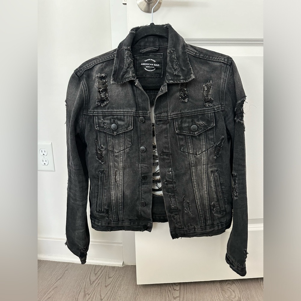 Distressed denim jacket